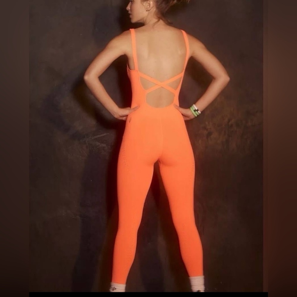 9. FP Movement Good Karma Onesie Neon Coral
